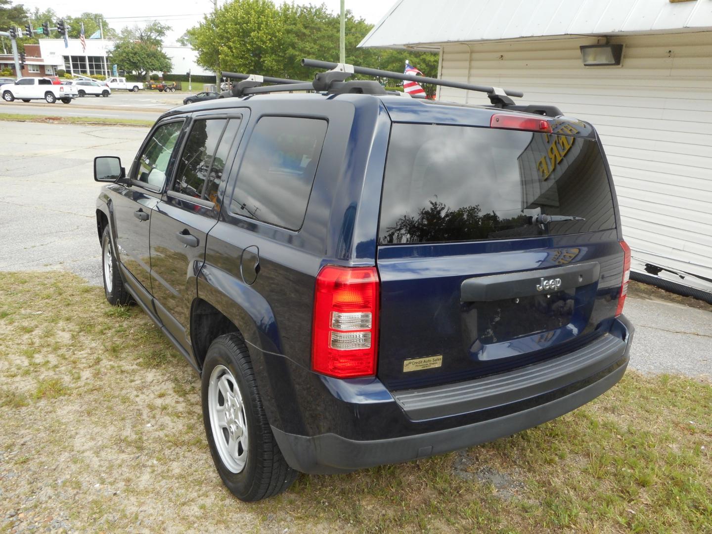 2014 Blue Jeep Patriot Sport 2WD (1C4NJPBA5ED) with an 2.0L L4 DOHC 16V engine, located at 2553 Airline Blvd, Portsmouth, VA, 23701, (757) 488-8331, 36.813889, -76.357597 - ***VEHICLE TERMS*** Down Payment: $999 Weekly Payment: $90 APR: 23.9% Repayment Terms: 42 Months *** CALL ELIZABETH SMITH - DIRECTOR OF MARKETING @ 757-488-8331 TO SCHEDULE YOUR APPOINTMENT TODAY AND GET PRE-APPROVED RIGHT OVER THE PHONE*** - Photo#7